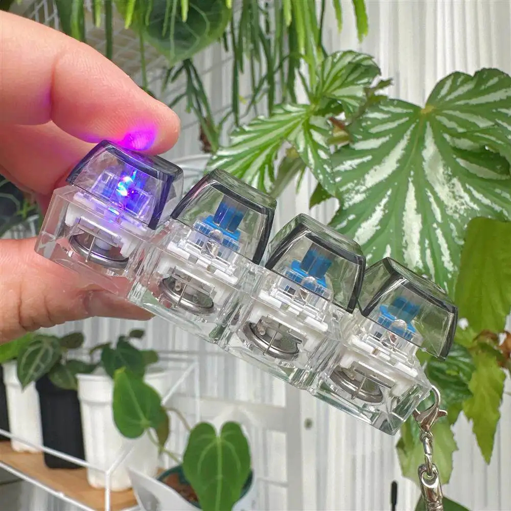 Clickable Button Light Up Keyboard Keychain Silent Operation Glowing LED Button Hot Gadget Four Finger Design