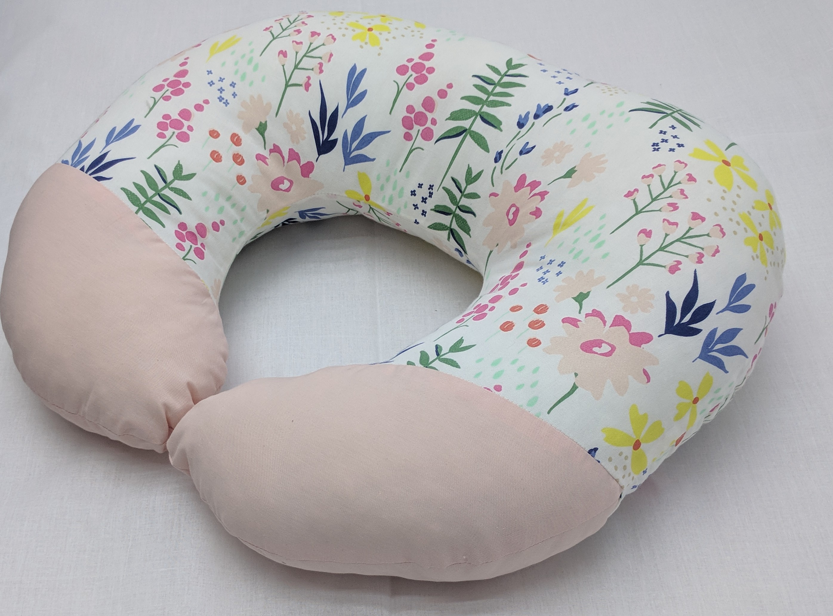 Nursing pillow outlet for tummy time