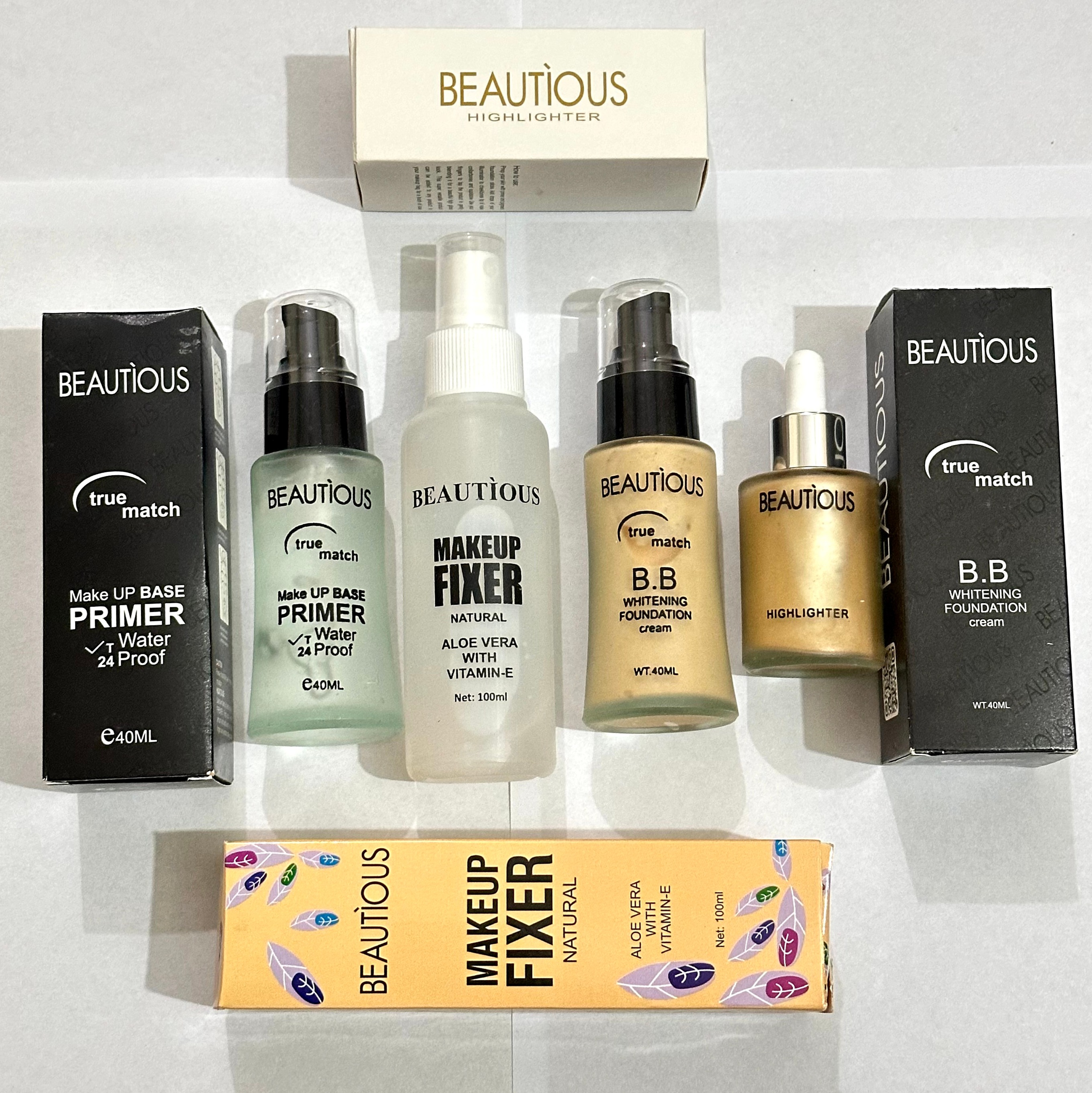 Beautious Deal of 04 Foundation + Liquid Highlighter + Primer Pump + fixer