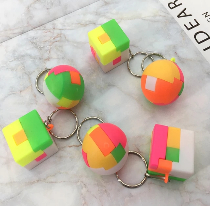 Pack of 4- Intelligent Puzzle with Key Chain Rings for KIDS PLAY FUN (High Quality)
