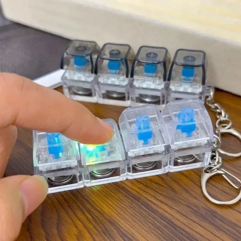 Clickable Button Light Up Keyboard Keychain Silent Operation Glowing LED Button Hot Gadget Four Finger Design