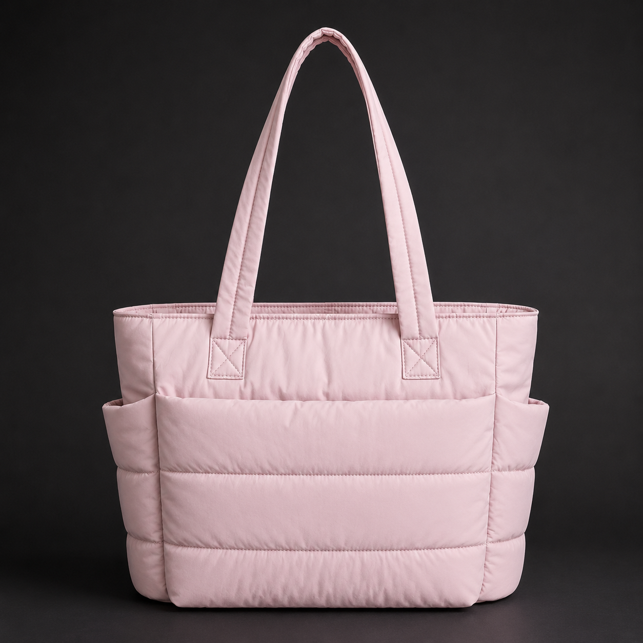 Stylish Puffer Tote Bag Made with Premium Water-Repellent, Imported Nylon Fabric, Thick Cushioned Puffy Design, Shock-Absorbing Laptop Protection, Smooth Durable Zipper Closure, Soft Polyester Interior Lining, Side Accessory Pockets & Reinforced