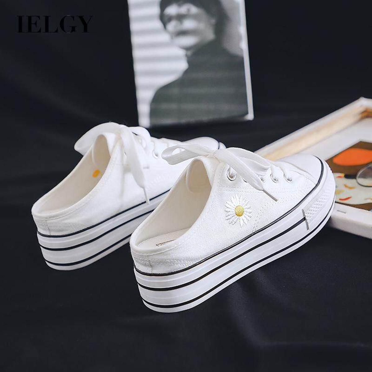 IELGY small daisy thick-soled inner increase 5CM heelless canvas shoes women