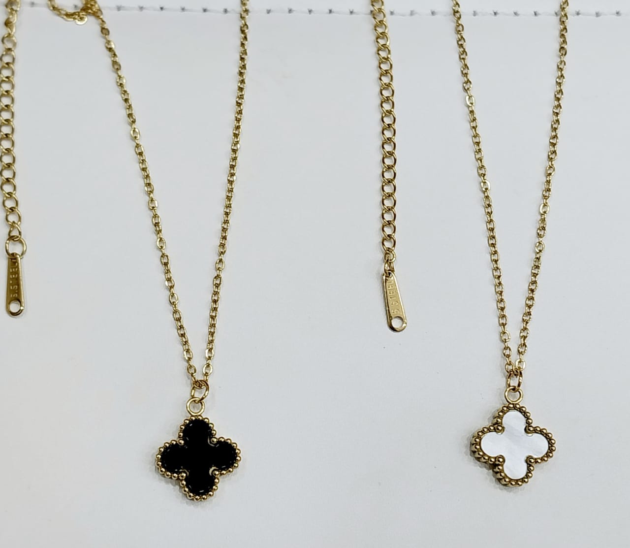 New double sided black and white clover chain with locket for girls