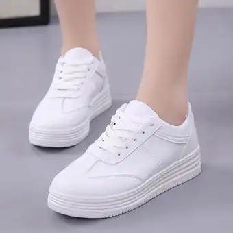 white shoes with colorful bottom