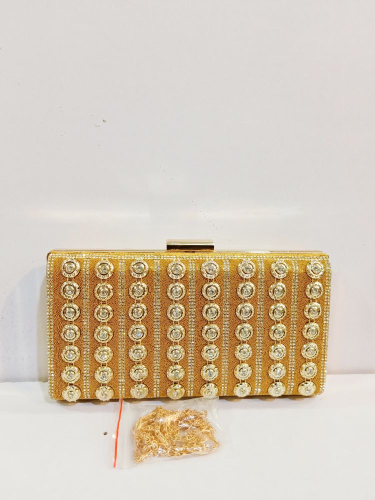Quality Golden Metal Cut work Hand Clutch With Golden Chain. .