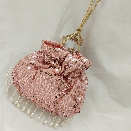 SHINY fancy potly clutch with pearl tassels