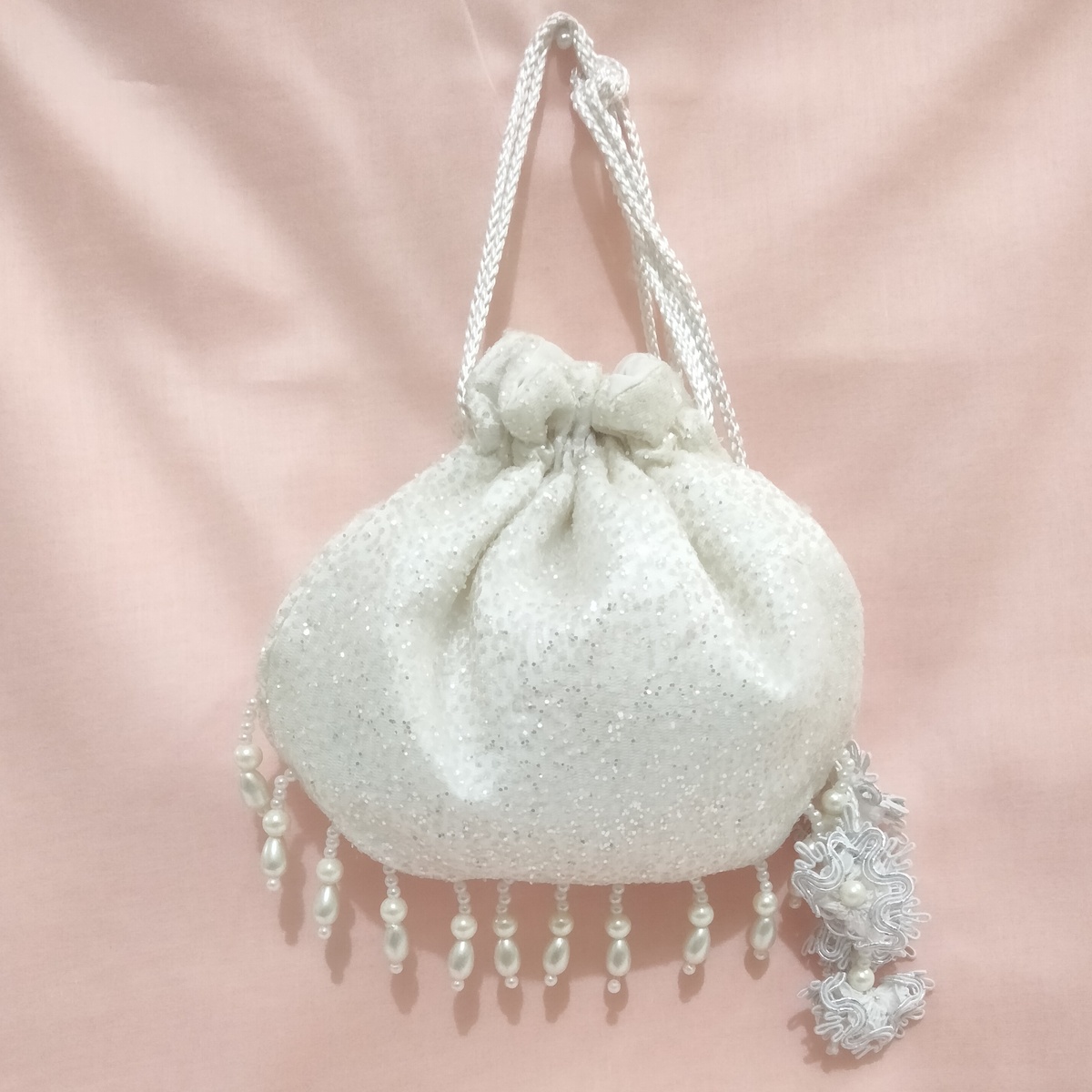 SHINY fancy potly clutch with pearl tassels