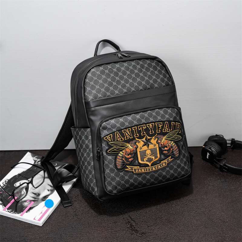 Sac à dos pour ordinateur portable pour homme avec broderie originale - Sac de travail antivol de grande capacité et résistant à l'eau, sac d'ordinateur durable de 15 pouces, style de voyage unisexe 2025_voghion.com