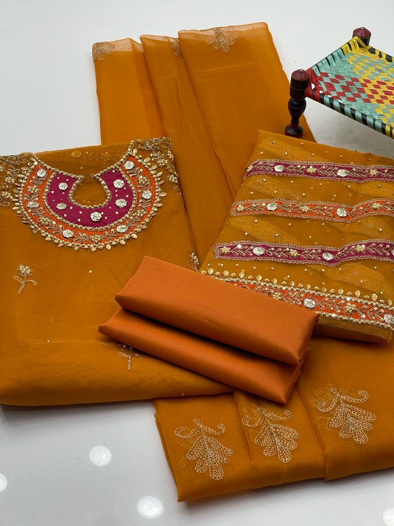 New Fancy Organza Unstitched Wedding Dress for Women – Organza Work Shirt, Organza Booti Work Dupatta, and Katan Silk Trouser