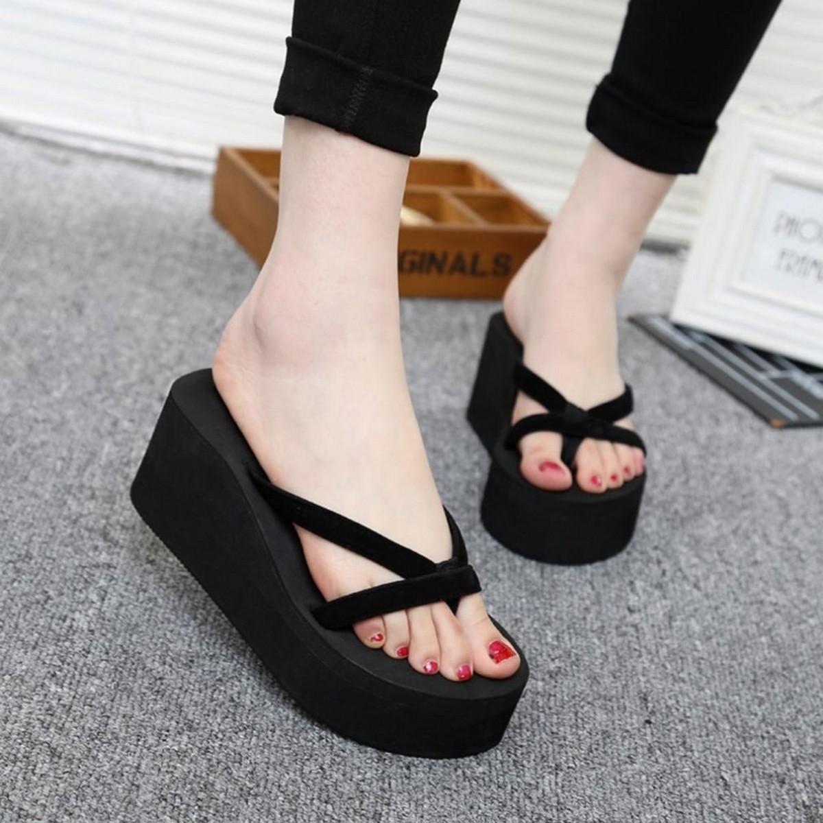 black platform wedge flip flops