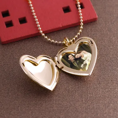 Heart shaped locket with on sale photo