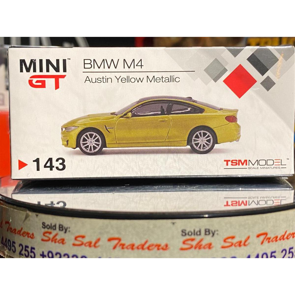Mini GT # 143 BMW M4 Austin Yellow Metallic with safe box sealed