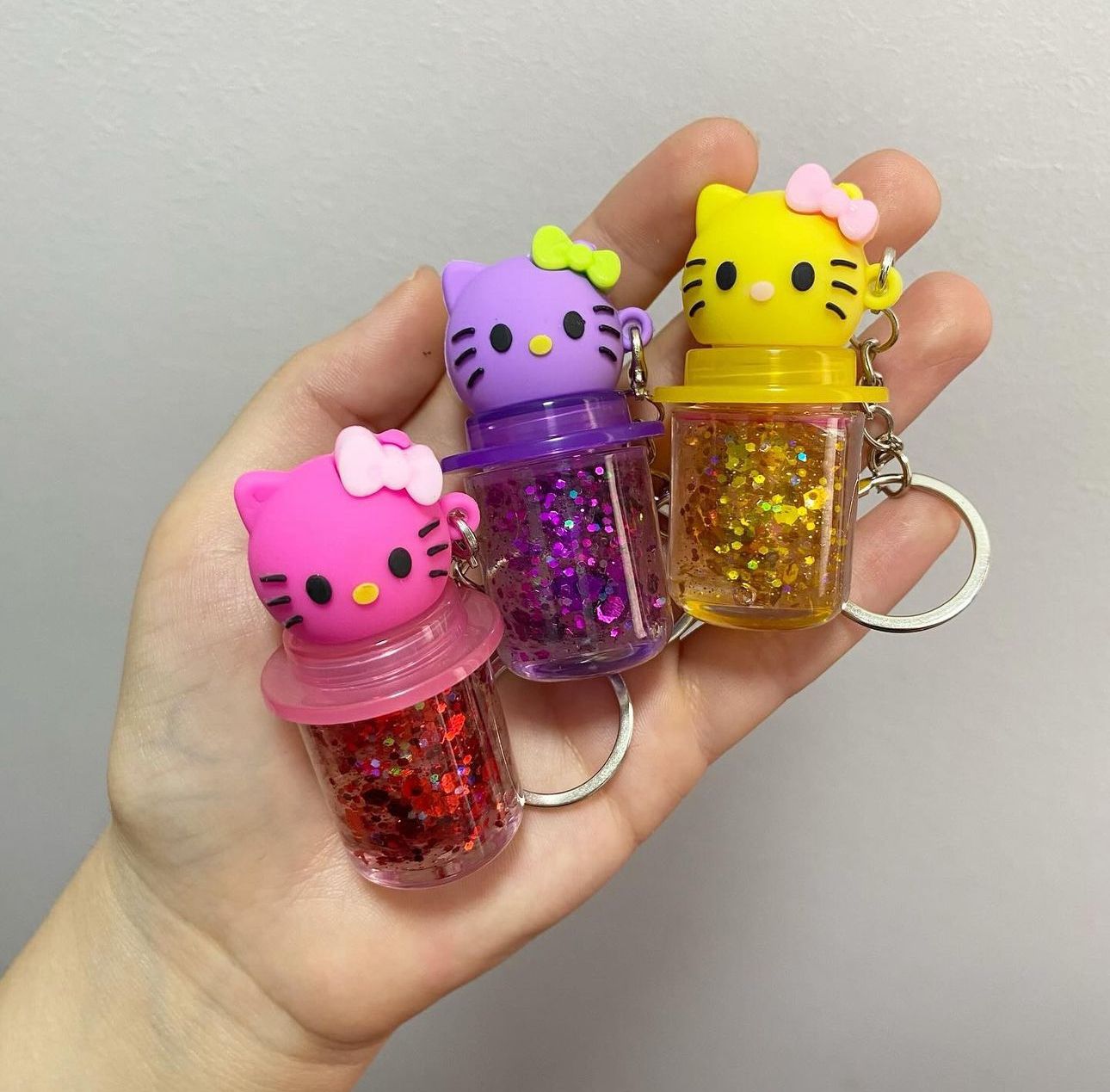 Hello Kitty keychain Color changing Glitter lip gloss | Daraz.pk