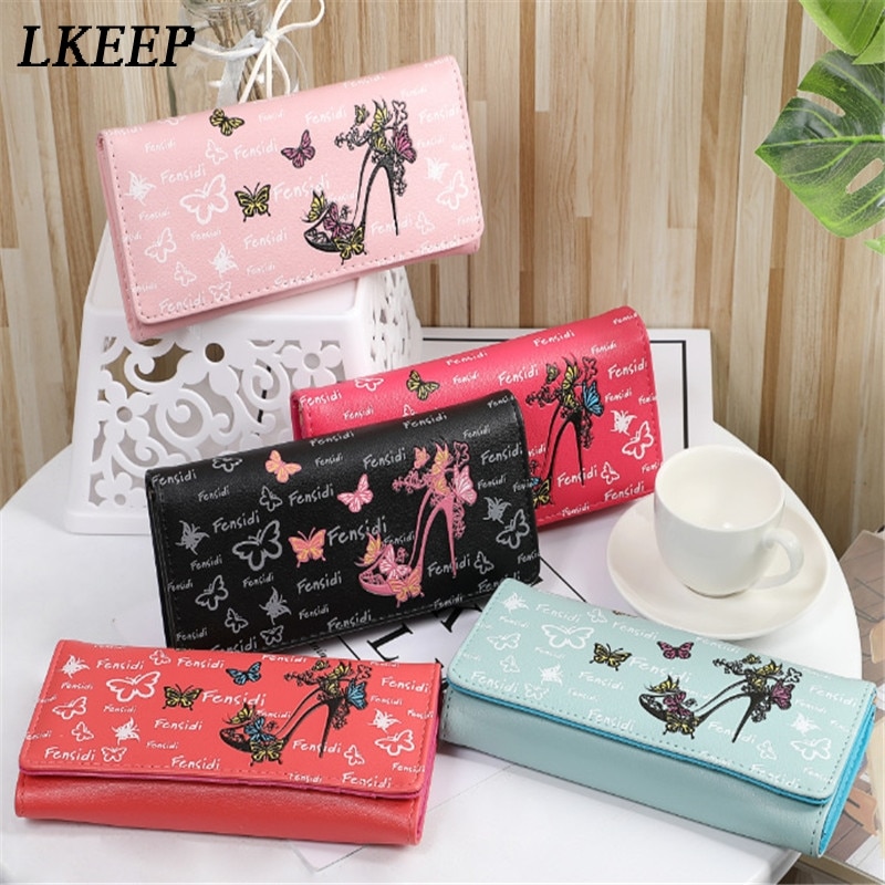mini camera bolsa with butterfly print coach